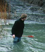 Morgan up to his ... in a creek.