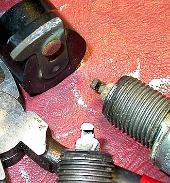 Fouled spark plugs and burnt rotor